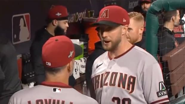 Arizona Diamondbacks SP Merrill Kelly and manager Torey Lovullo during NLCS Game 6